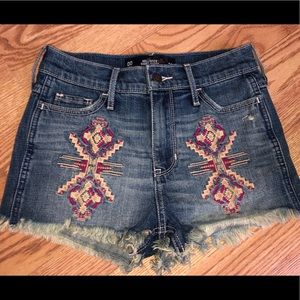 High-waisted medium wash denim shorts